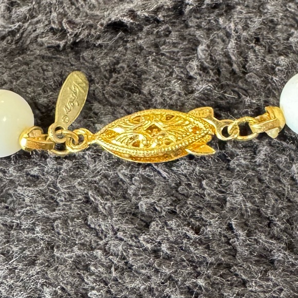 Napier Single Strand Gold-toned Clasp Necklace which is Embossed. - Picture 4 of 8